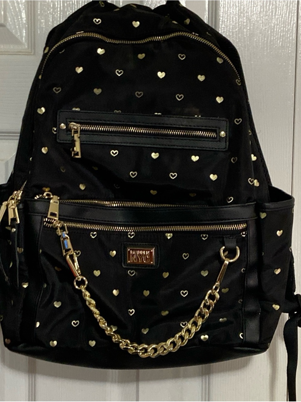 NYC Black Heart-Studded Backpack with Gold Chain Accent